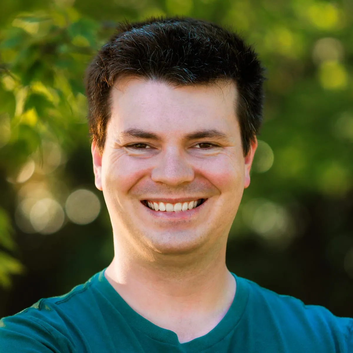 Nathan Nixon, smiling outdoors